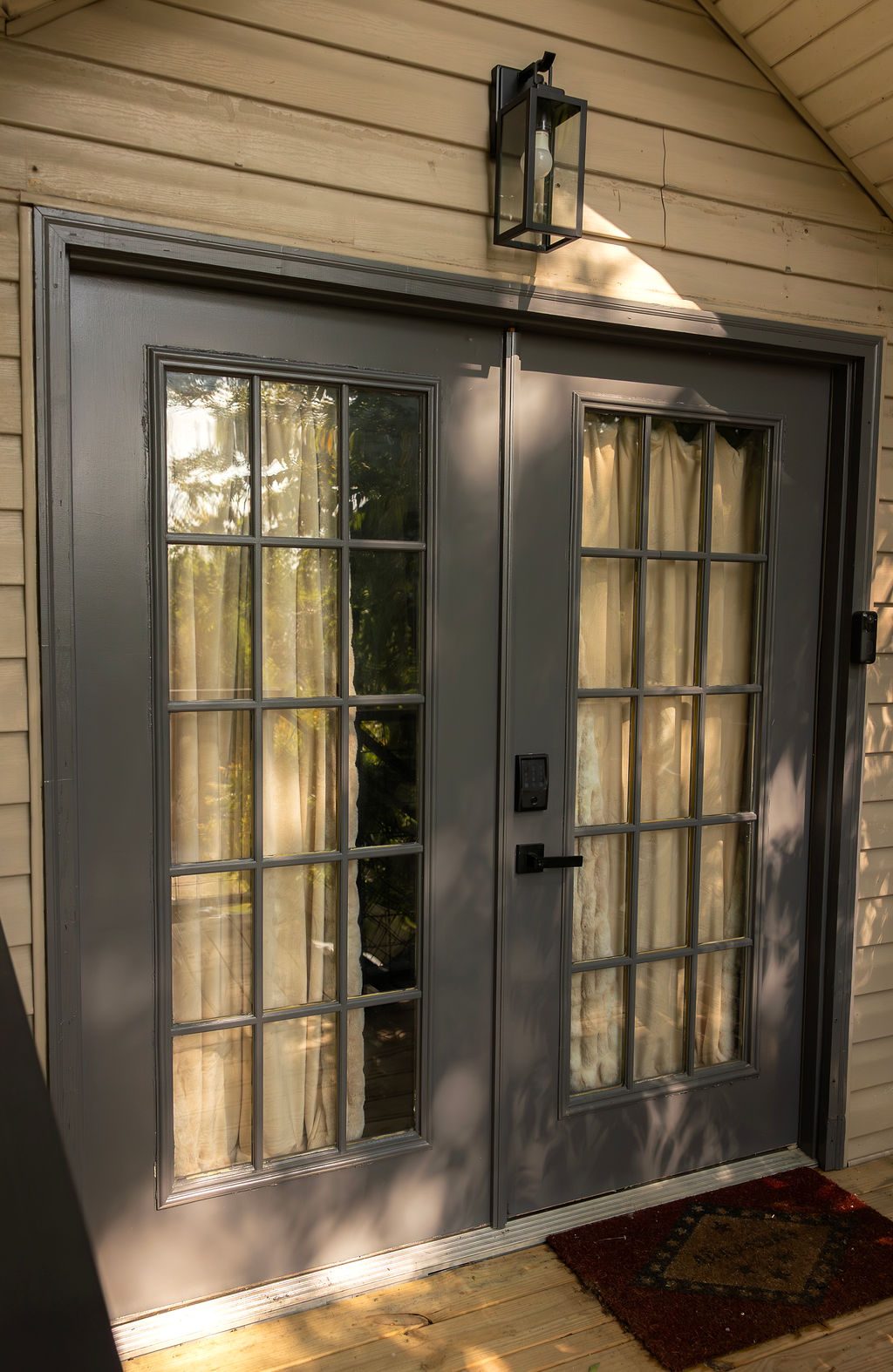 French doors to the third-floor balcony