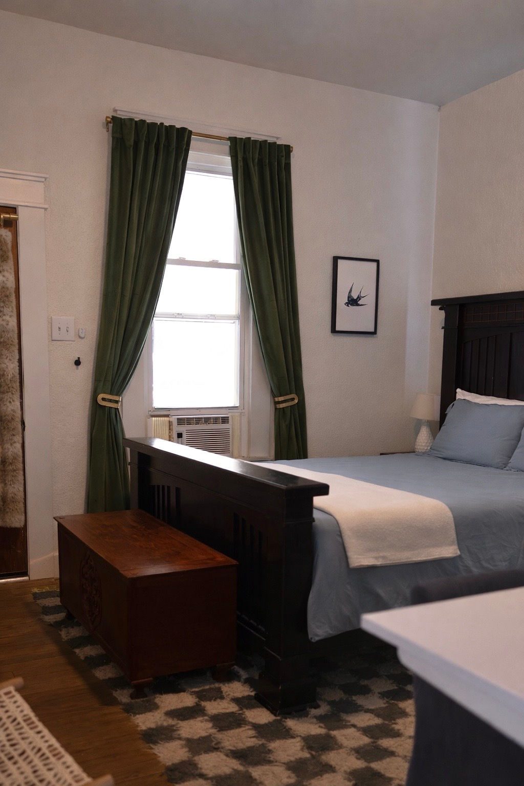 Queen bed in the front bedroom
